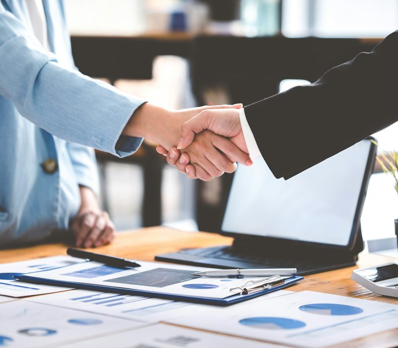 business people shaking hands at the office teamwork
